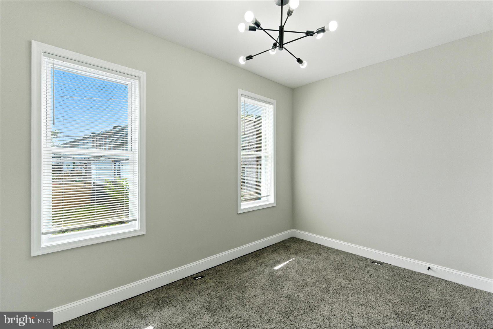 1607 Montpelier Street Baltimore, MD 21218 - Photo 29 of 37 a view of an empty room with a window
