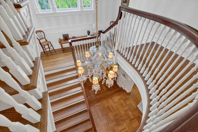 a bedroom with a bed a fireplace and a couch