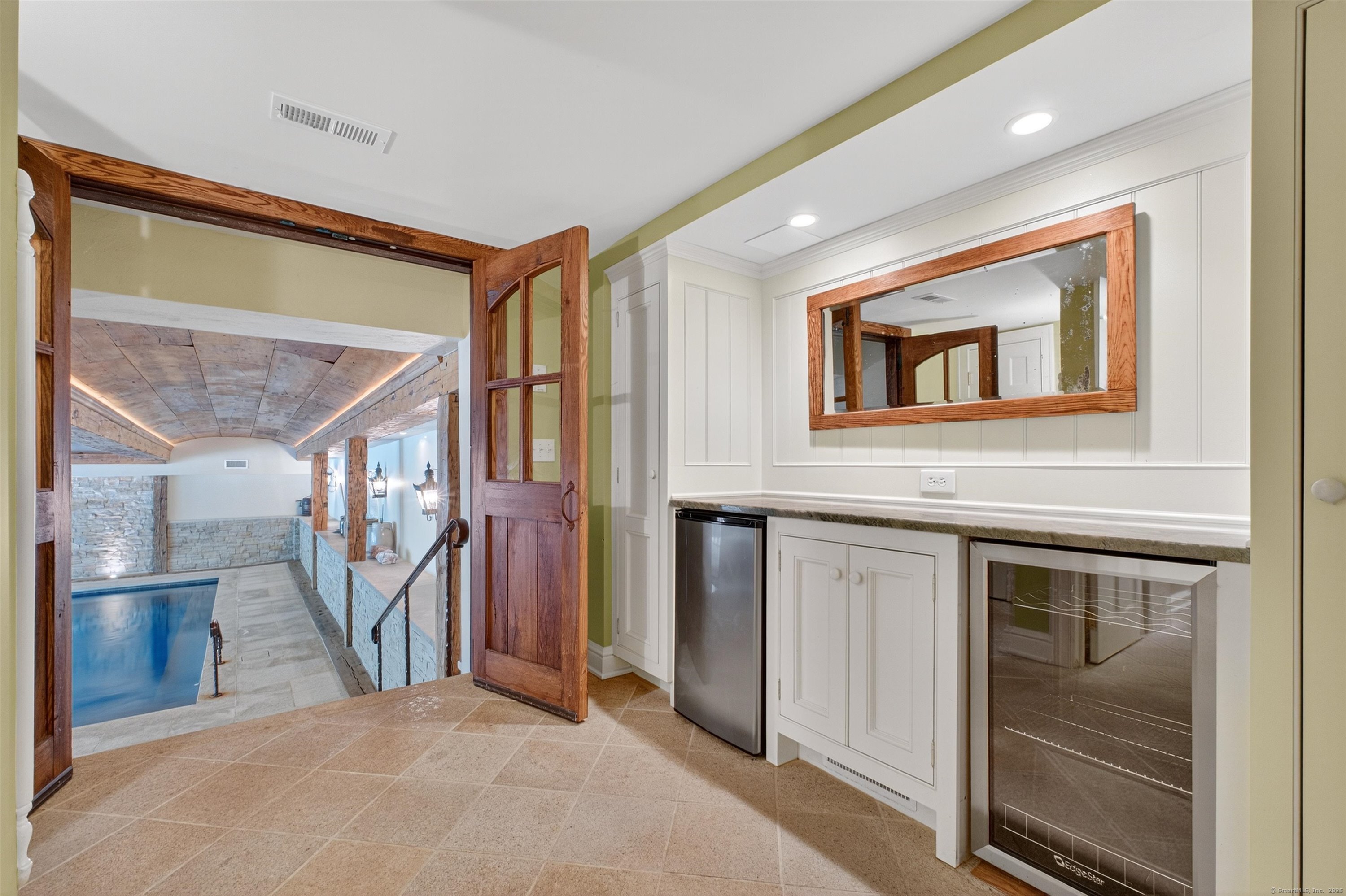 88 Main Street Ridgefield, CT 06877 - Photo 31 of 39 a view of a hallway with entryway and front door