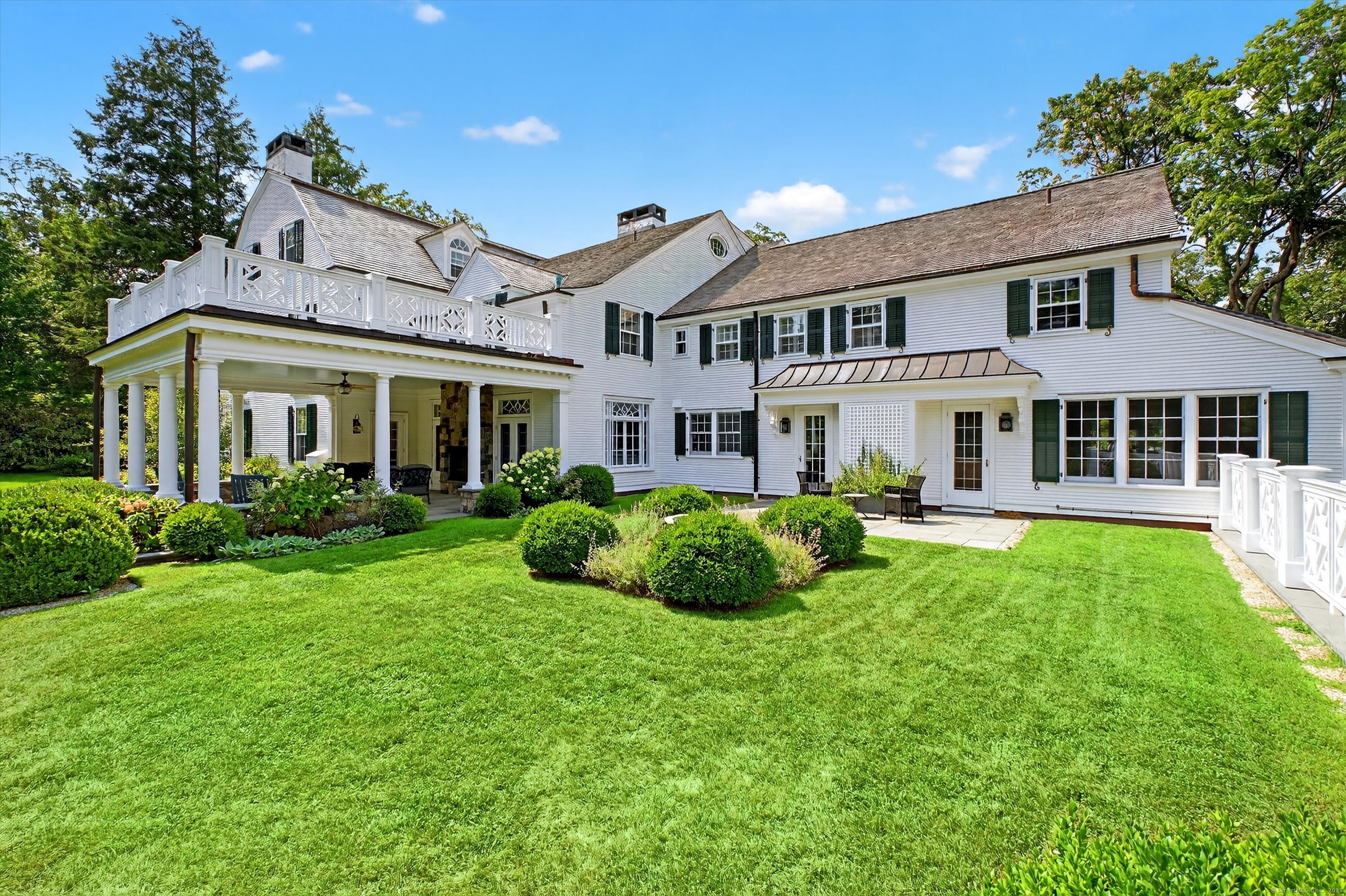 88 Main Street Ridgefield, CT 06877 - Photo 37 of 39 a view of house with a garden
