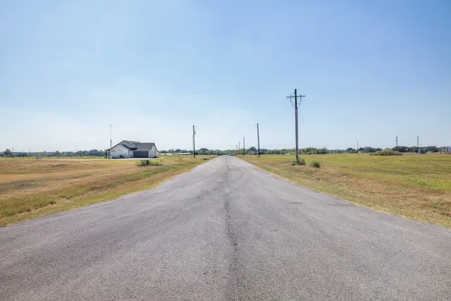 a view of a city with a lake