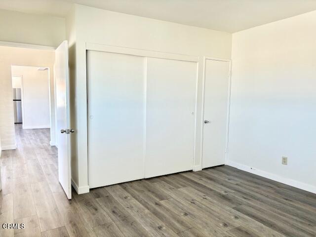 3289 Ocean Drive, Unit 3 Oxnard, CA 93035 - Photo 14 of 18 a view of an empty room with wooden floor