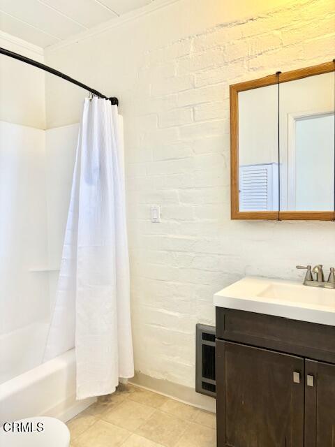 3289 Ocean Drive, Unit 3 Oxnard, CA 93035 - Photo 15 of 18 a bathroom with a sink and a mirror