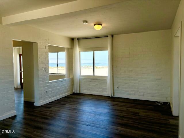 3289 Ocean Drive, Unit 3 Oxnard, CA 93035 - Photo 3 of 18 a view of empty room with wooden floor and fan