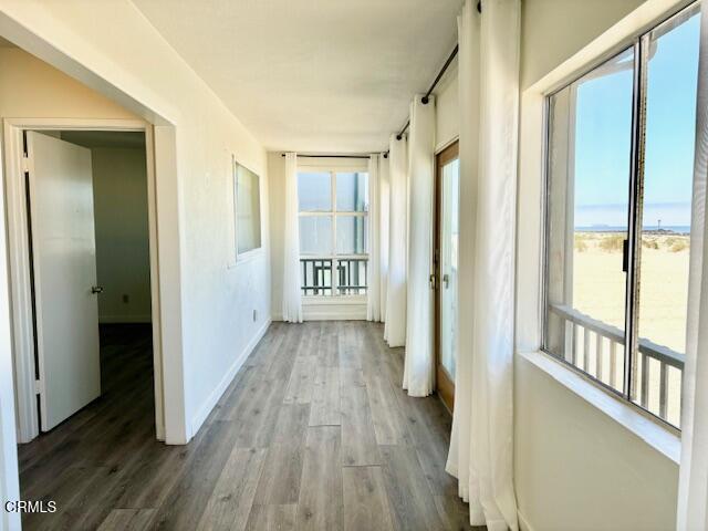 3289 Ocean Drive, Unit 3 Oxnard, CA 93035 - Photo 10 of 18 a view of hallway with wooden floor