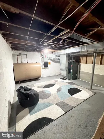 a view of a garage with wooden floor