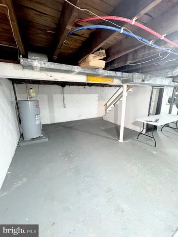a view of a garage with wooden floor