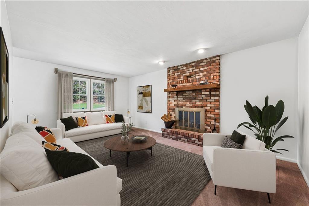 126 Jefferson Drive Apollo, PA 15613 - Photo 12 of 31 a living room with furniture floor to ceiling window and a flat screen tv