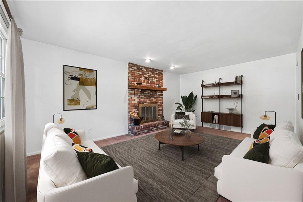 126 Jefferson Drive Apollo, PA 15613 - Photo 13 of 31 a living room with furniture and a wooden floor