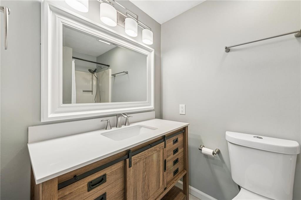 126 Jefferson Drive Apollo, PA 15613 - Photo 22 of 31 a bathroom with a sink a toilet and a mirror