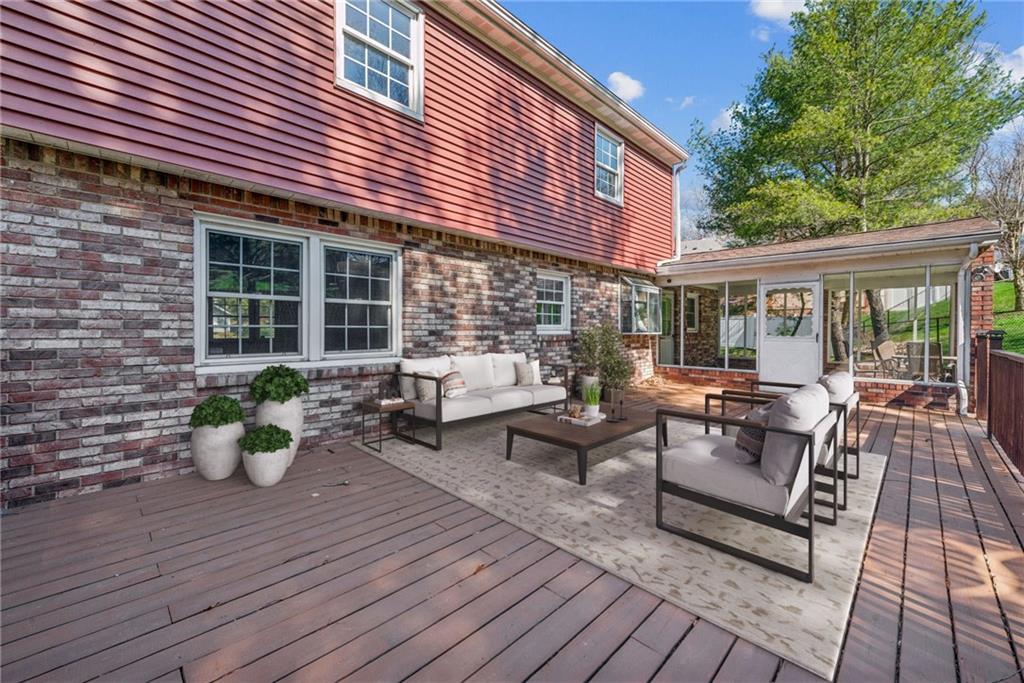 126 Jefferson Drive Apollo, PA 15613 - Photo 24 of 31 a view of a patio with couches and potted plants
