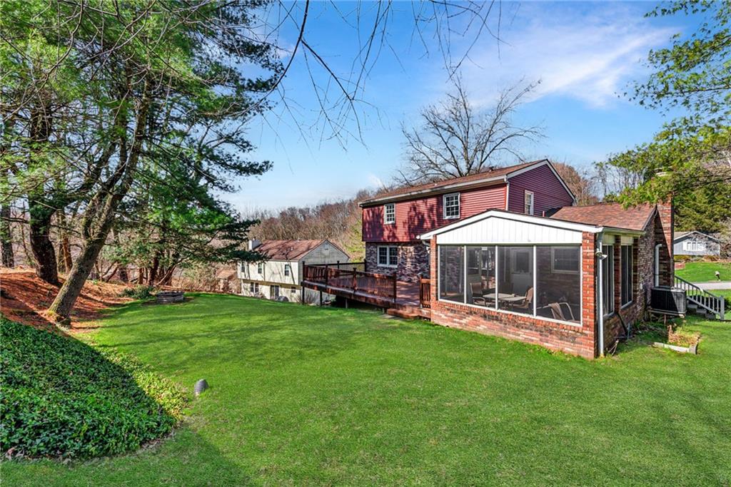 126 Jefferson Drive Apollo, PA 15613 - Photo 26 of 31 a view of a house with a yard and sitting area