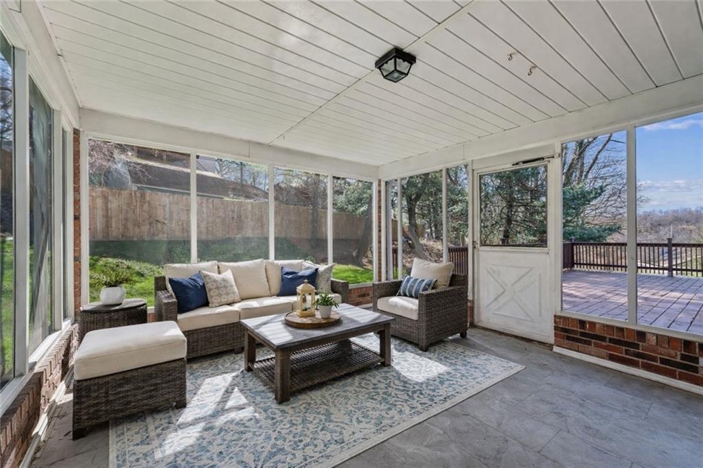 126 Jefferson Drive Apollo, PA 15613 - Photo 31 of 31 a living room with furniture and a flat screen tv