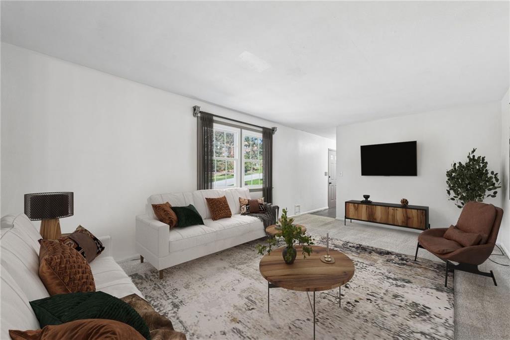 126 Jefferson Drive Apollo, PA 15613 - Photo 5 of 31 a living room with furniture and a flat screen tv