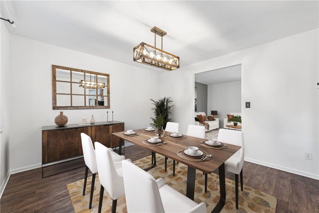 126 Jefferson Drive Apollo, PA 15613 - Photo 7 of 31 a view of a dining room with furniture a chandelier and wooden floor