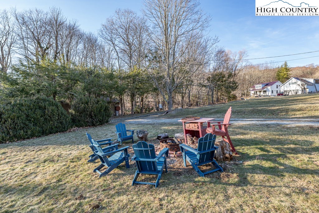 40 Painter Road Banner Elk, NC 28604 - Photo 14 of 45 a view of a chairs and table in the patio