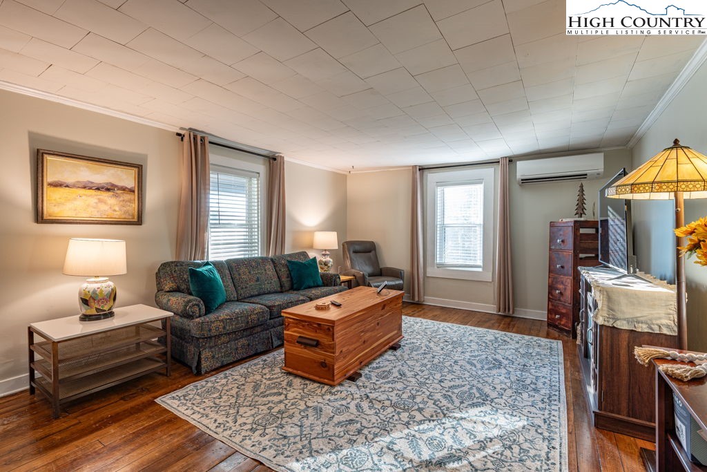 40 Painter Road Banner Elk, NC 28604 - Photo 24 of 45 a living room with furniture a flat screen tv and a window