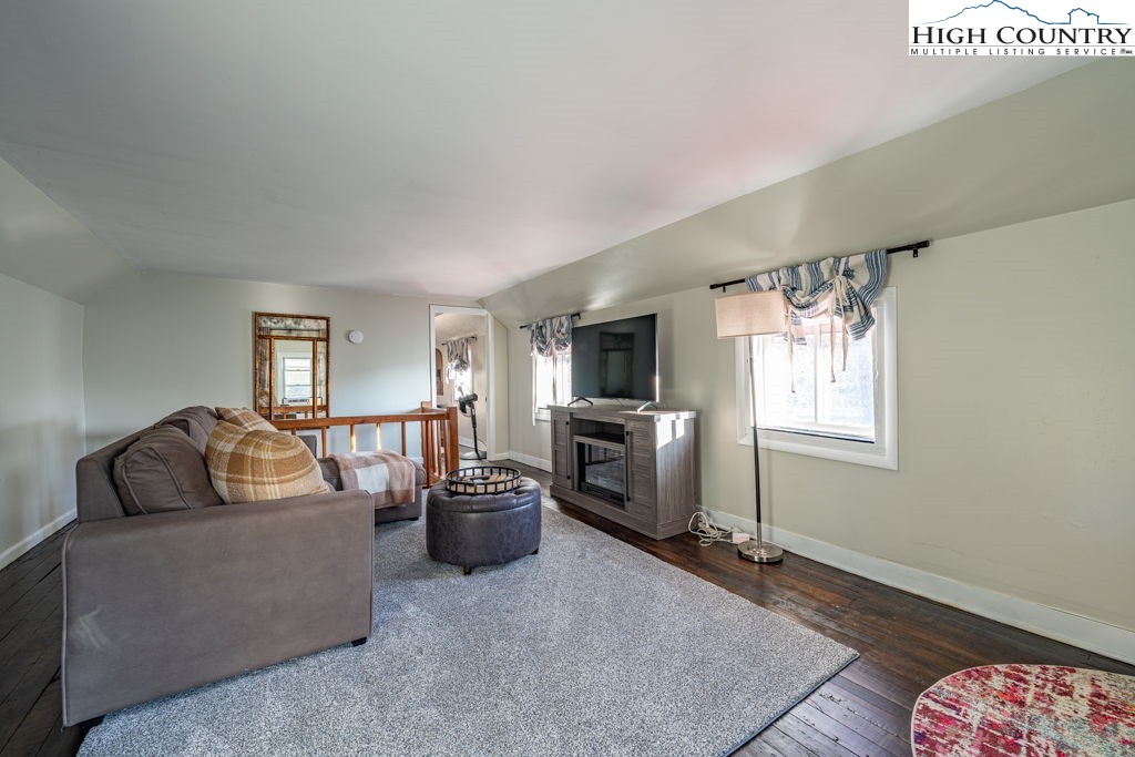 40 Painter Road Banner Elk, NC 28604 - Photo 28 of 45 a living room with furniture and a flat screen tv