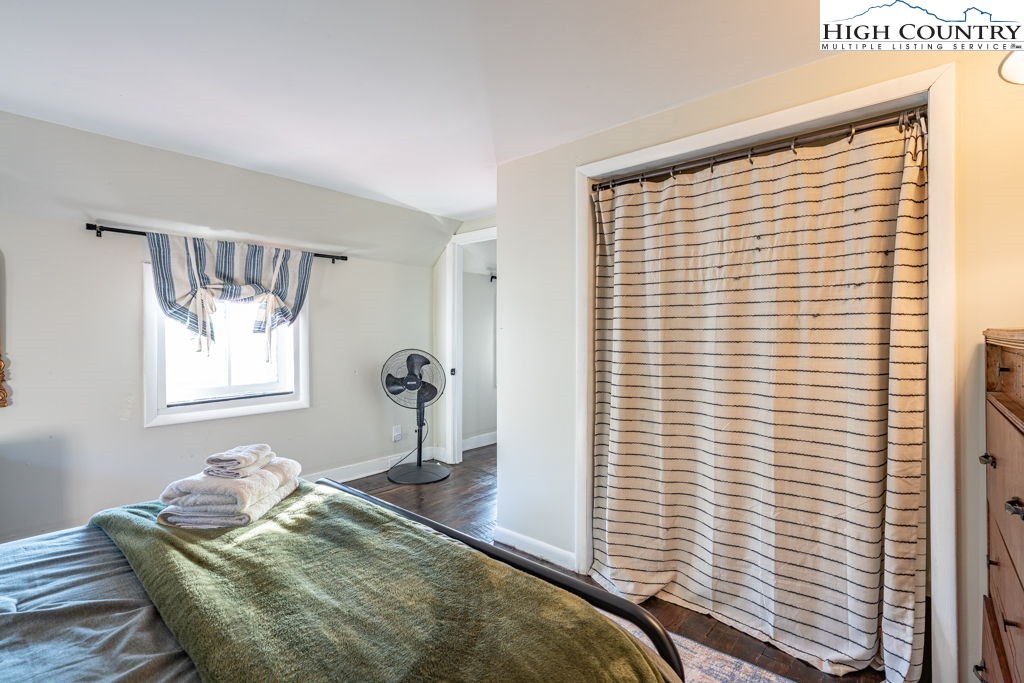 40 Painter Road Banner Elk, NC 28604 - Photo 33 of 45 a bedroom with a bed and a window