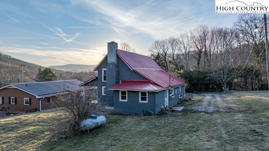 40 Painter Road Banner Elk, NC 28604 - Photo 34 of 45 a view of a house with a yard