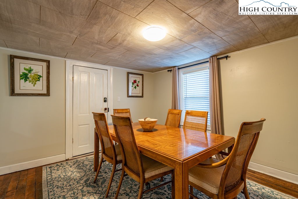 40 Painter Road Banner Elk, NC 28604 - Photo 6 of 45 a view of a dining room with furniture