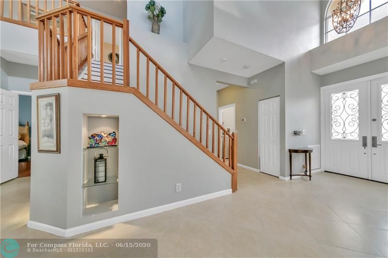 7680 Belmonte Boulevard Margate, FL 33063 - Photo 24 of 30 a view of a hallway with windows