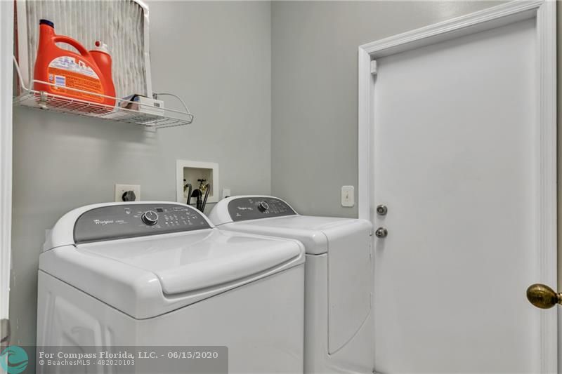 7680 Belmonte Boulevard Margate, FL 33063 - Photo 26 of 30 a utility room with dryer and washer