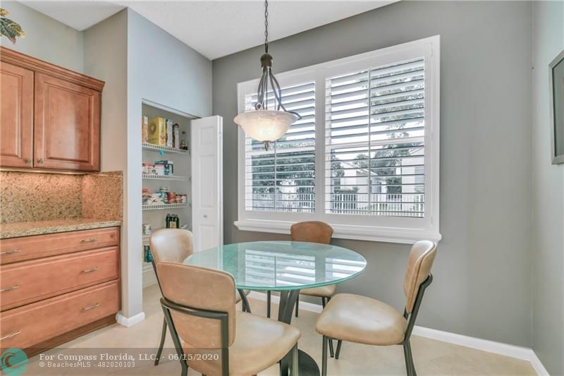7680 Belmonte Boulevard Margate, FL 33063 - Photo 9 of 30 a view of a dining room with furniture window and outside view