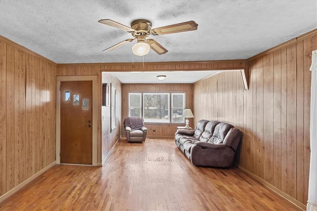 3186 Highway 411 White, GA 30184 - Photo 2 of 20 a living room with furniture and a large window
