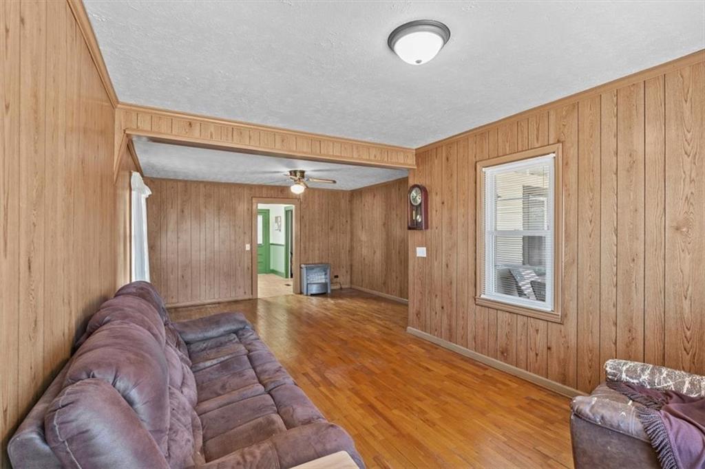 3186 Highway 411 White, GA 30184 - Photo 3 of 20 a living room with furniture and a window