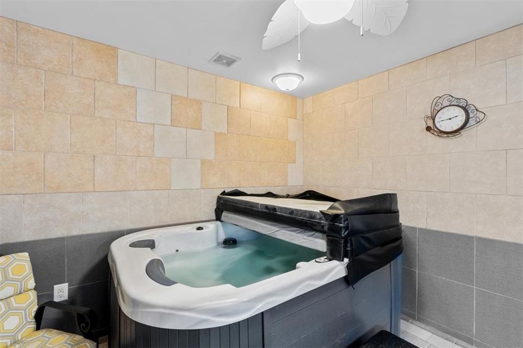 3186 Highway 411 White, GA 30184 - Photo 10 of 20 a bathroom with a sink and tub