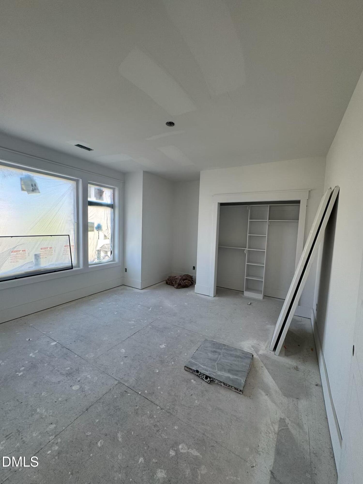 615 Velma Hopkins Lane Raleigh, NC 27603 - Photo 11 of 16 a view of an empty room with a window