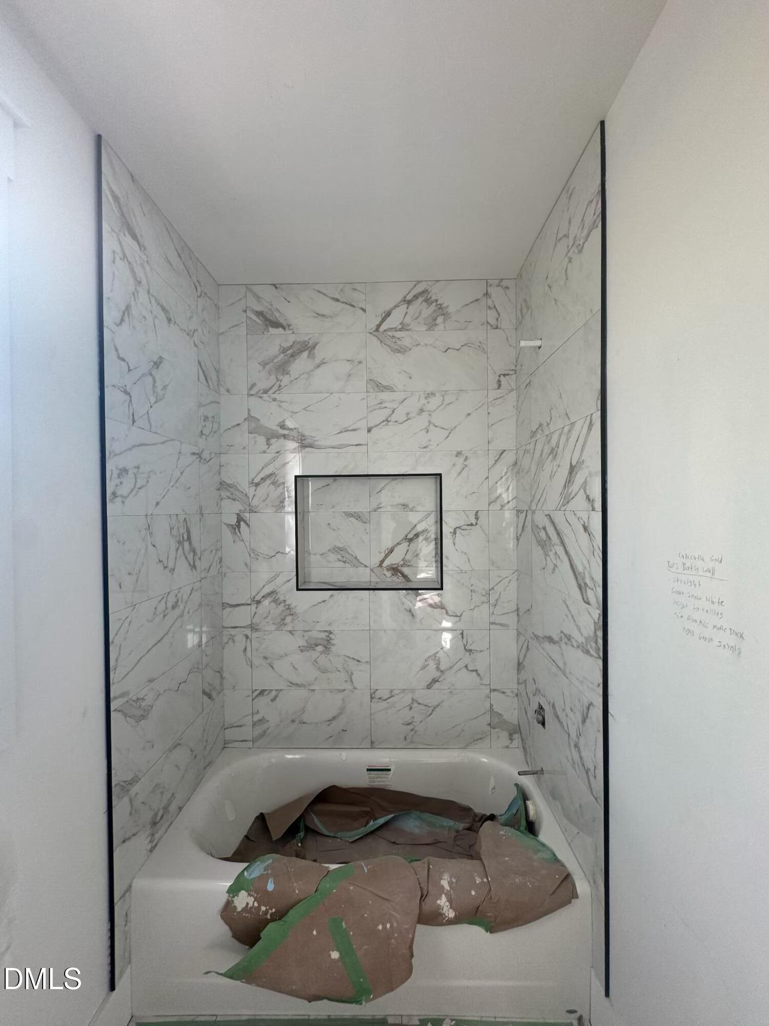 615 Velma Hopkins Lane Raleigh, NC 27603 - Photo 9 of 16 a bathroom with a sink and a shower