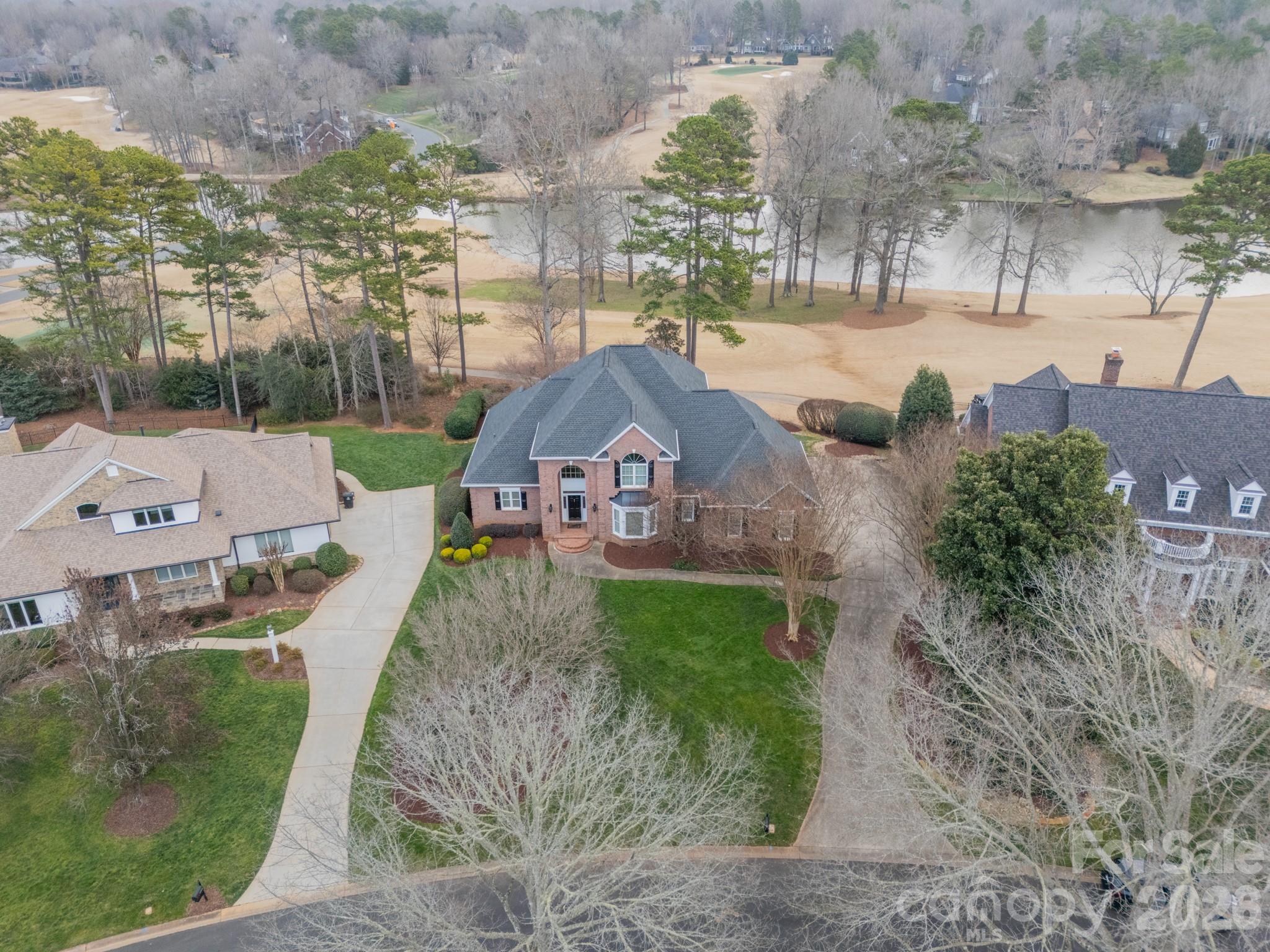 18908 Riverwind Lane Davidson, NC 28036 - Photo 2 of 35 an aerial view of a house with garden space and street view