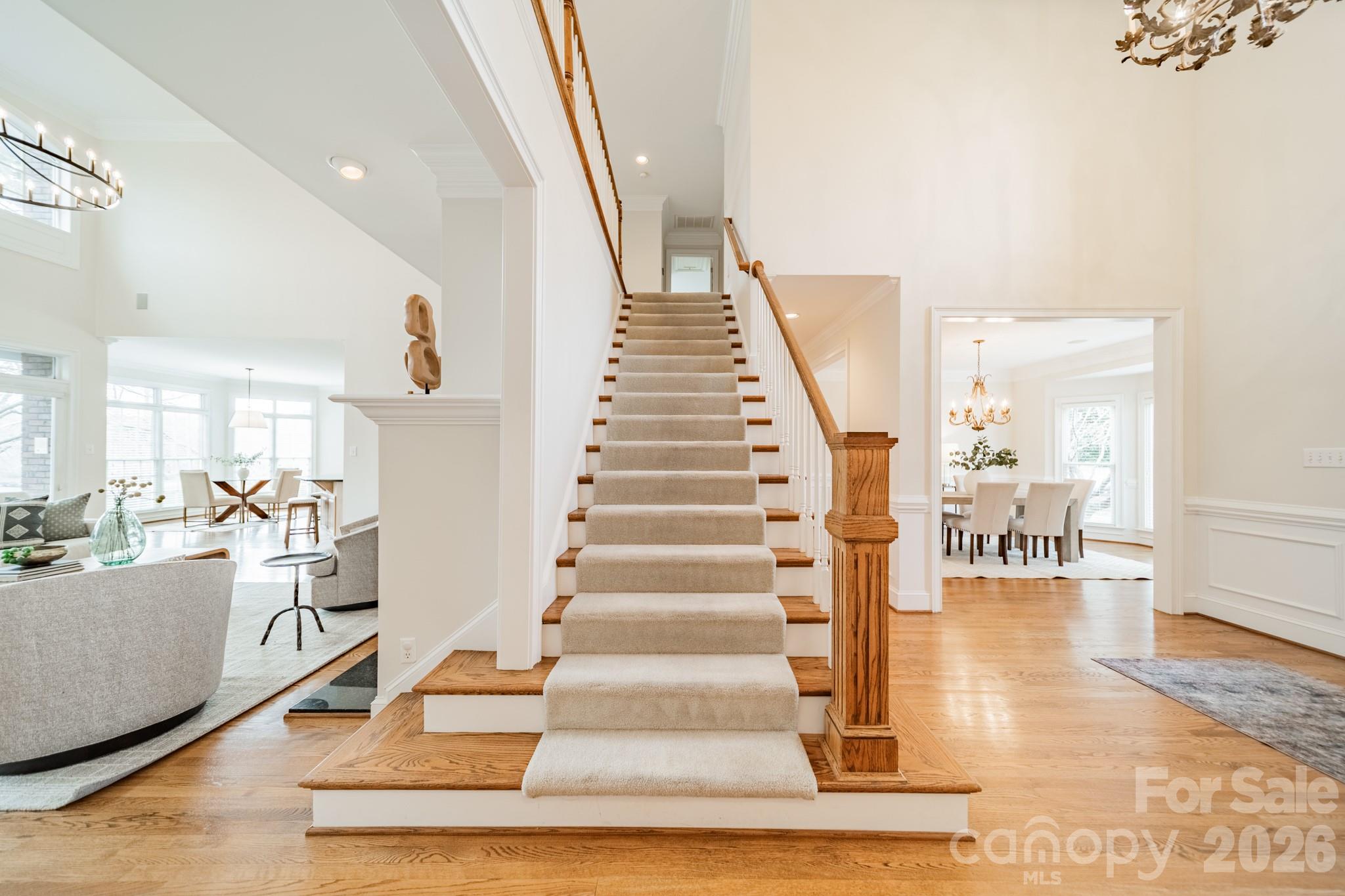 18908 Riverwind Lane Davidson, NC 28036 - Photo 22 of 35 a view of entryway and hall with wooden floor