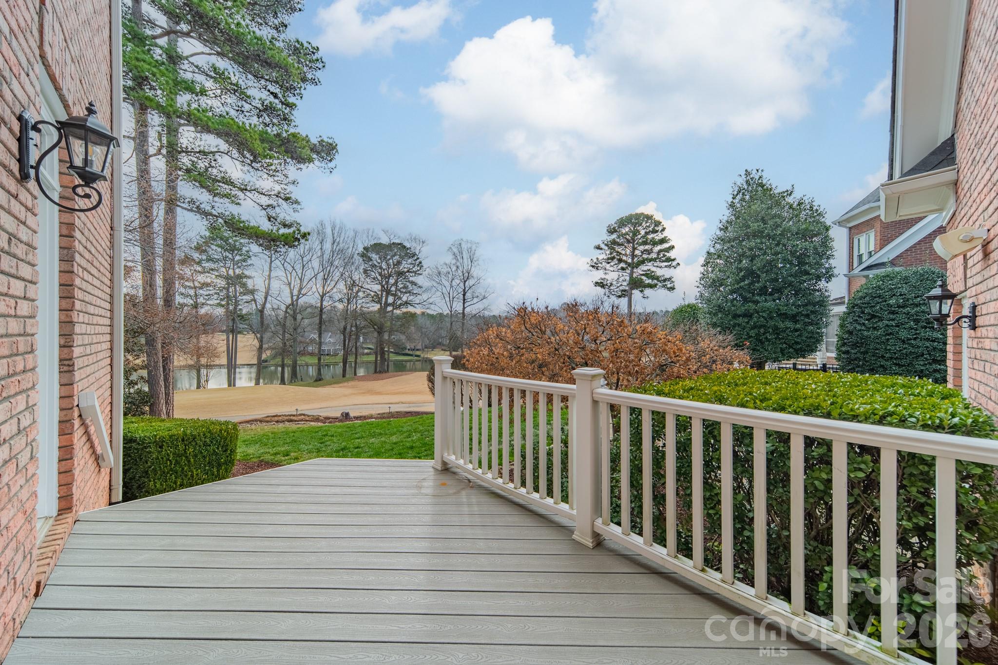 18908 Riverwind Lane Davidson, NC 28036 - Photo 31 of 35 a view of a porch with a yard