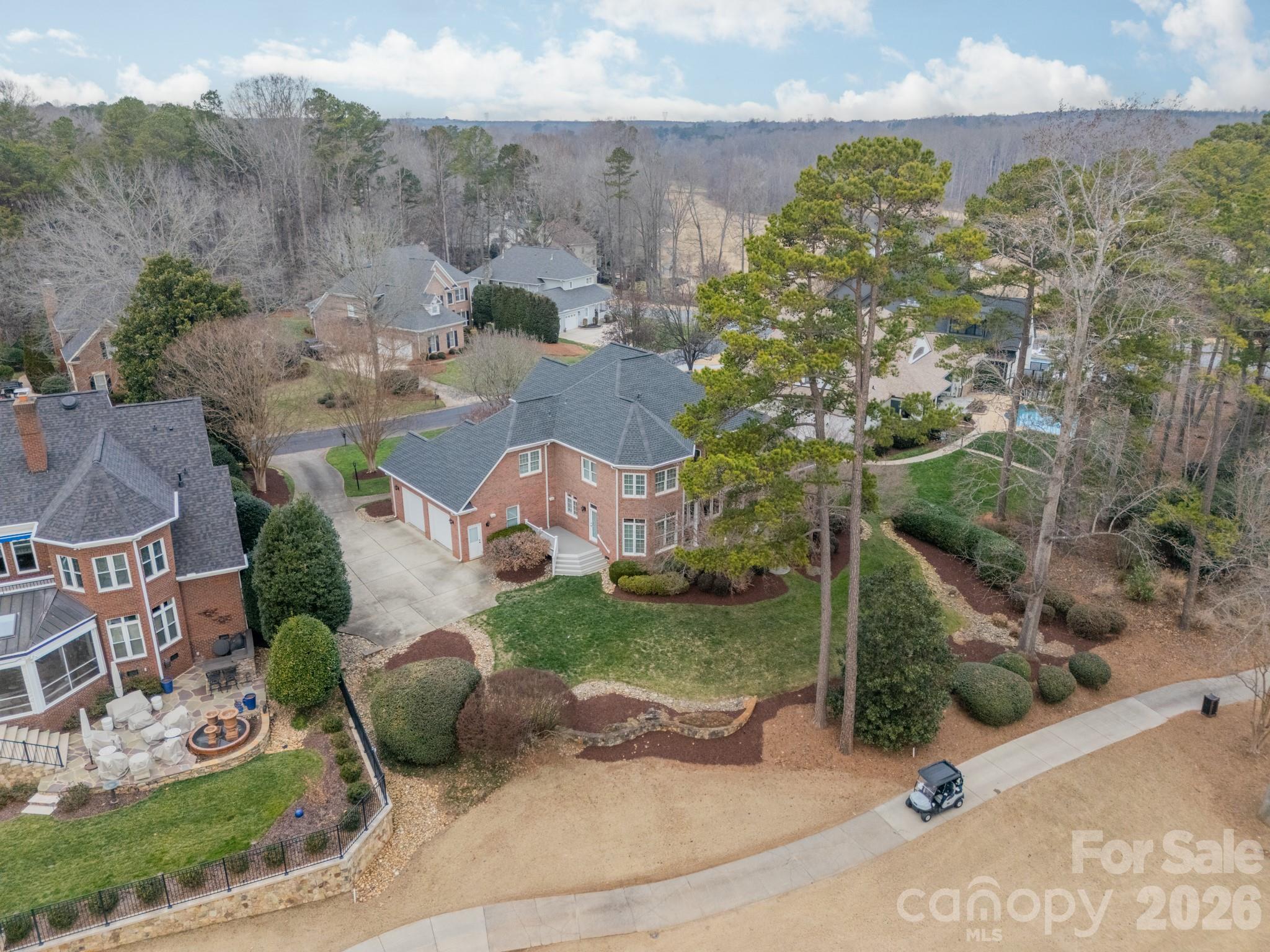 18908 Riverwind Lane Davidson, NC 28036 - Photo 32 of 35 an aerial view of a house with yard