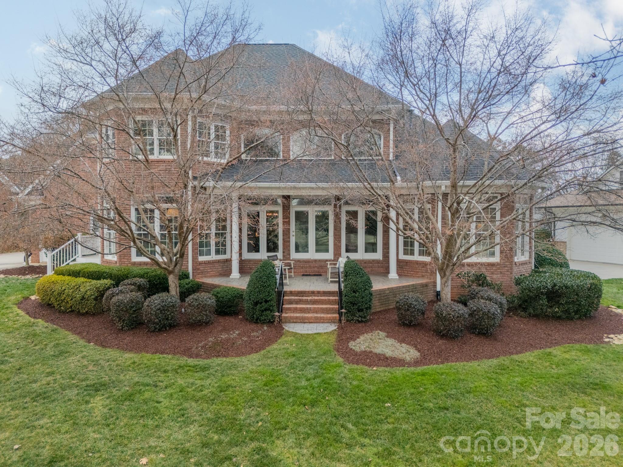 18908 Riverwind Lane Davidson, NC 28036 - Photo 33 of 35 a front view of a house with a yard