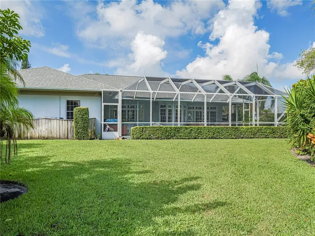 a view of a yard in front of a house