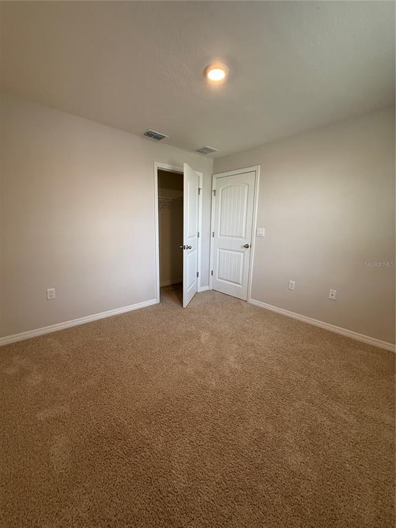13251 Pontoon Road Winter Garden, FL 34787 - Photo 19 of 24 a view of an empty room