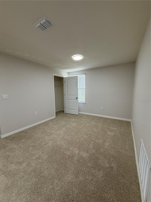 13251 Pontoon Road Winter Garden, FL 34787 - Photo 21 of 24 a view of an empty room