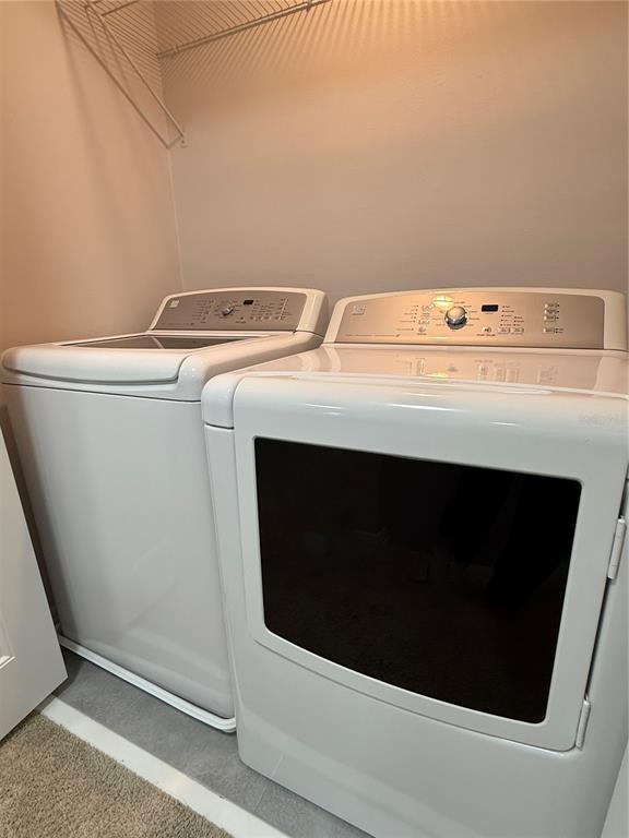 13251 Pontoon Road Winter Garden, FL 34787 - Photo 8 of 24 a utility room with dryer and washer