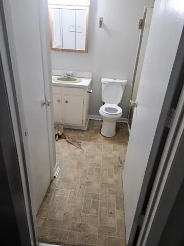 a bathroom with a sink and a toilet
