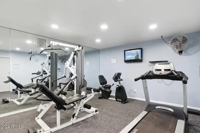 a view of a room with gym equipment