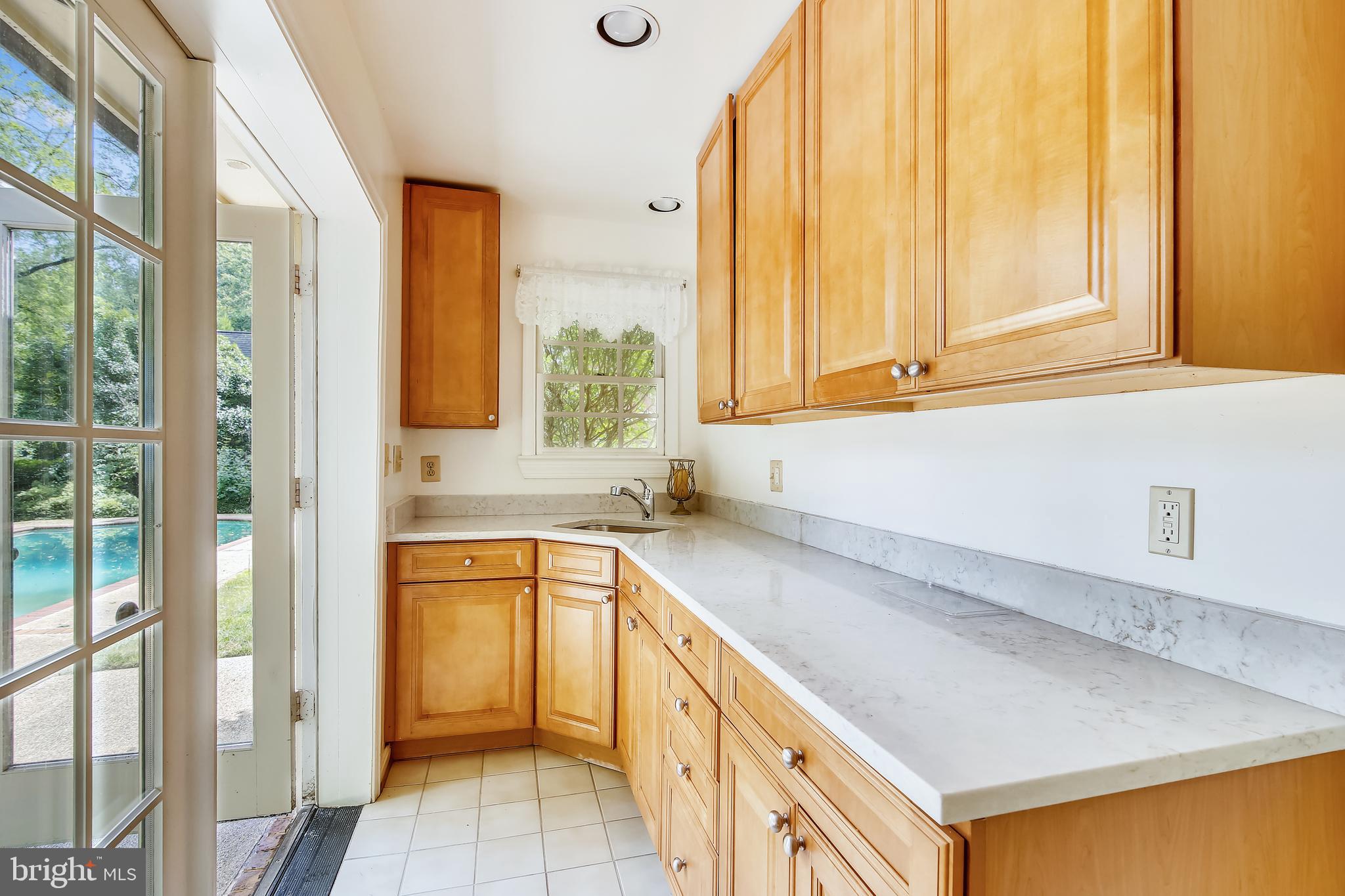 8723 Persimmon Tree Road Potomac, MD 20854 - Photo 38 of 81 Pool house kitchen