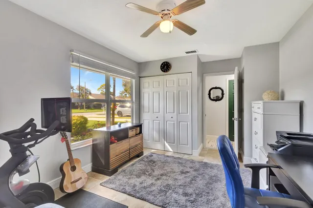 a view of a swimming pool with a porch