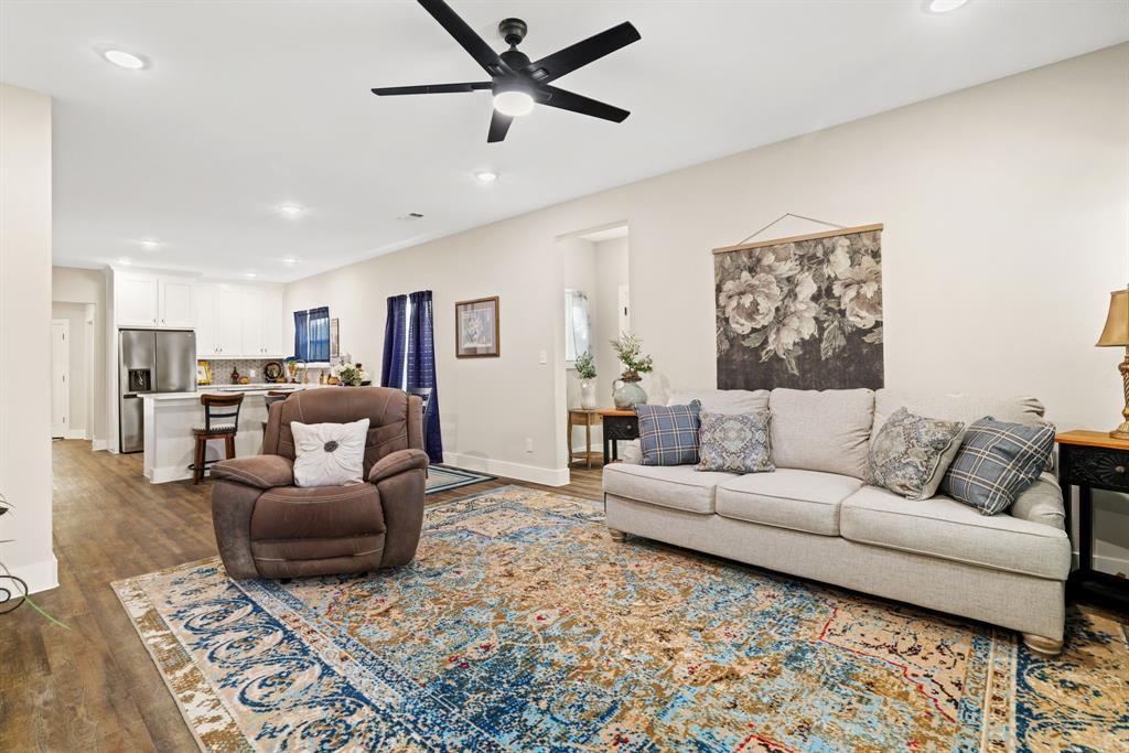 114 West Morton Street Denison, TX 75021 - Photo 4 of 22 a living room with furniture and a rug