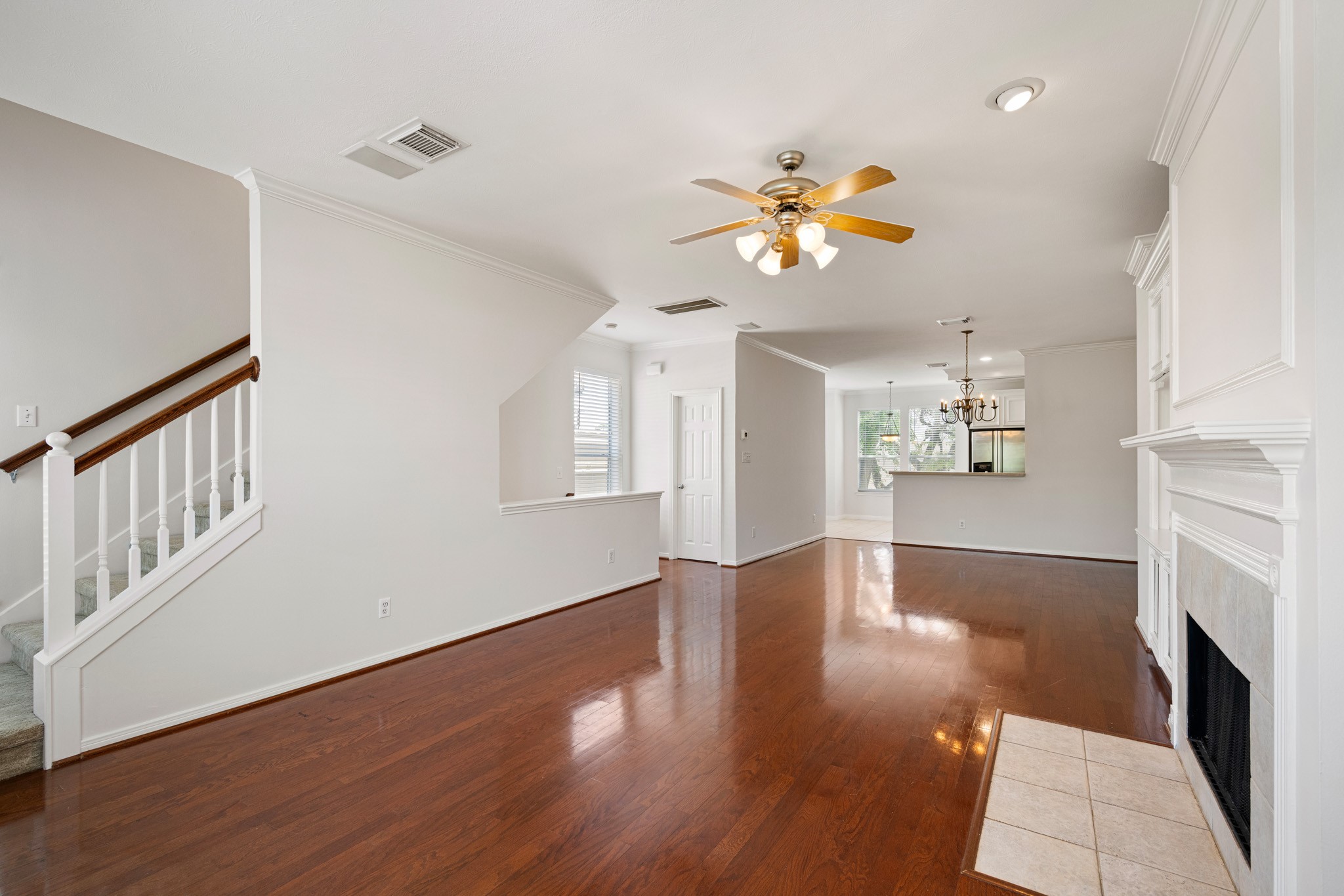 1727 Hadley Street Houston, TX 77003 - Photo 19 of 38 Second floor offering fresh paint, crown molding, ceiling fan and hardwoods.