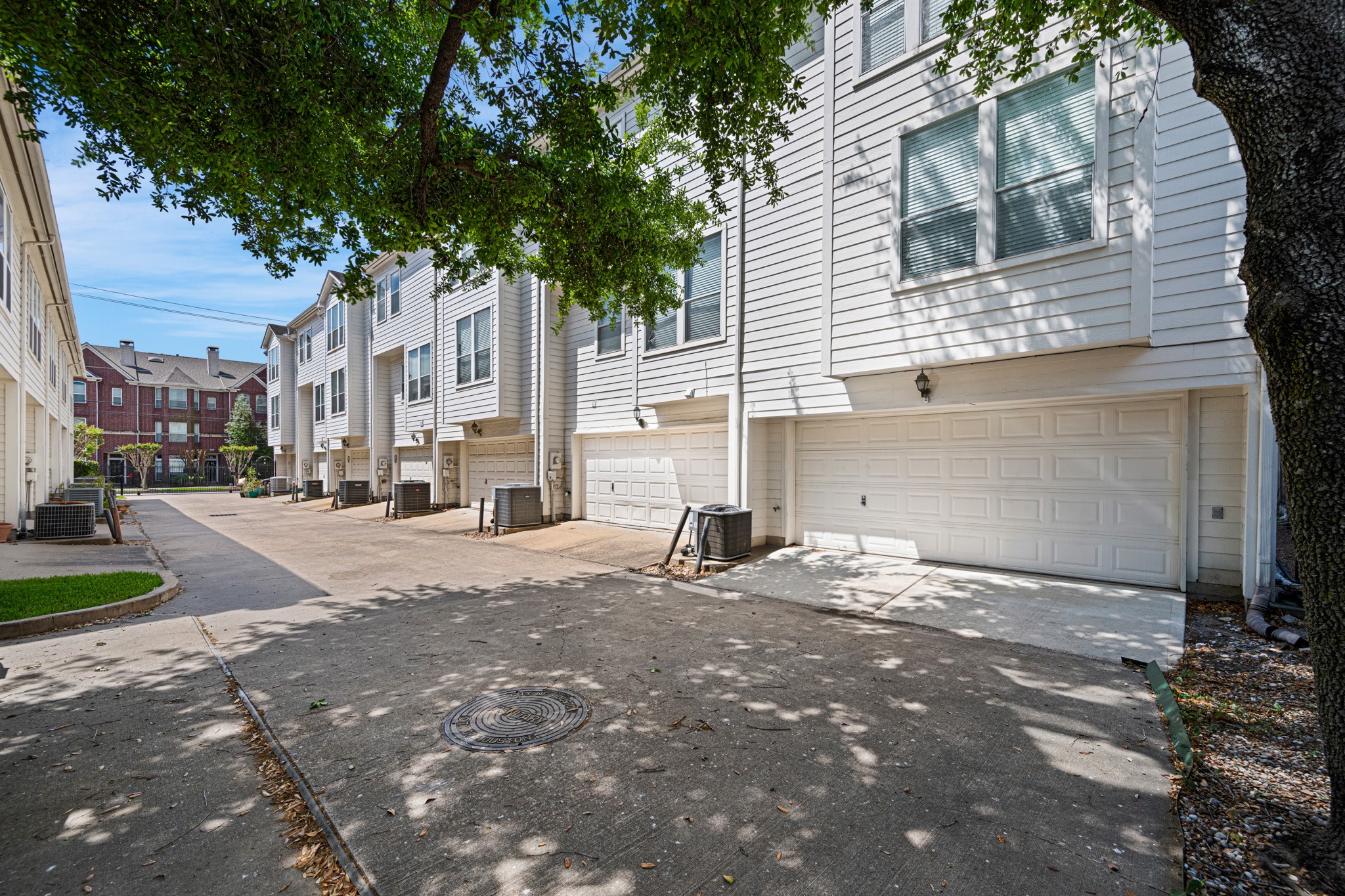 1727 Hadley Street Houston, TX 77003 - Photo 30 of 38 1727 Hadley is a desirable end unit, ideally situated across from guest parking within this charming gated community.