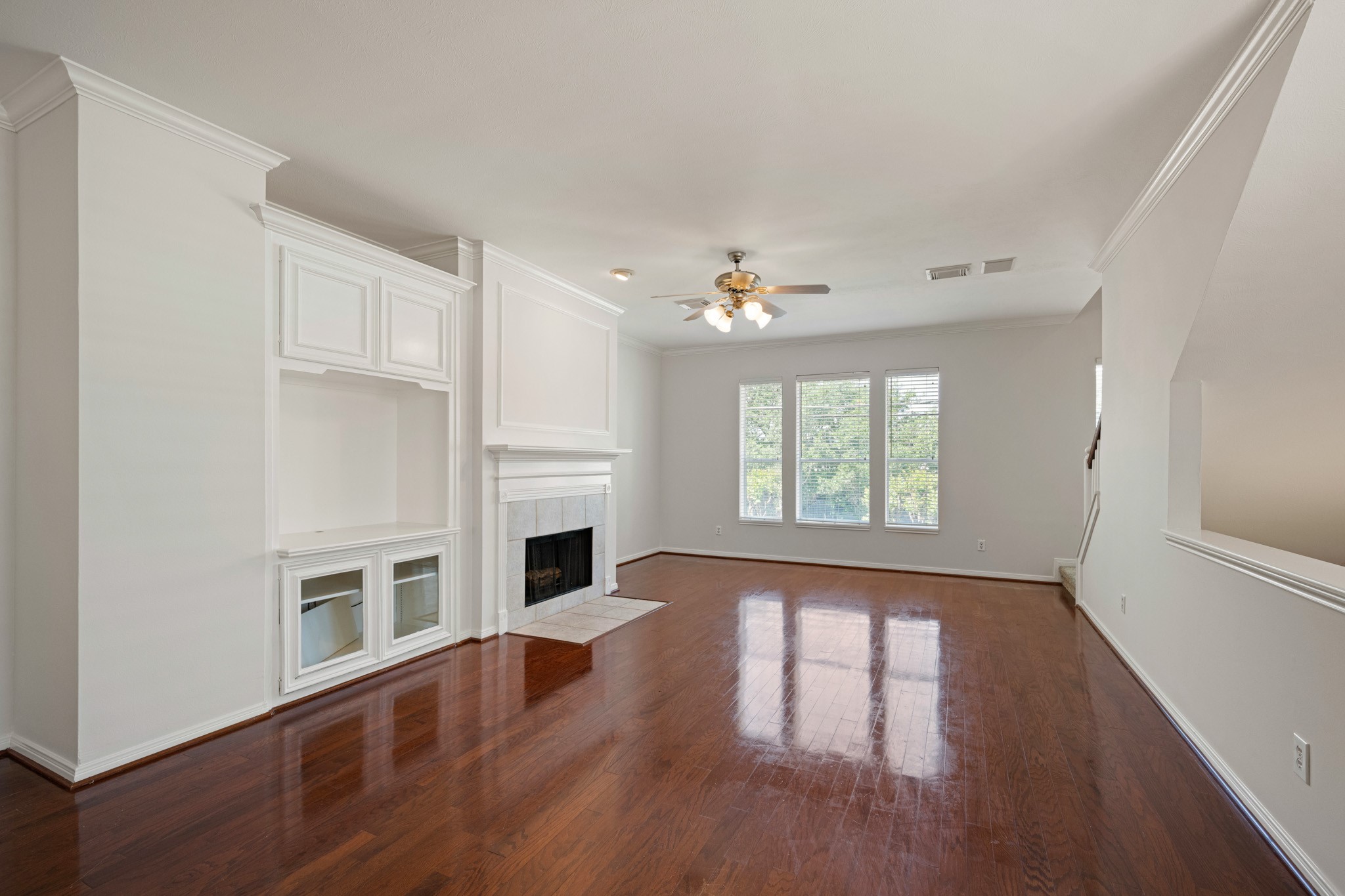 1727 Hadley Street Houston, TX 77003 - Photo 7 of 38 Second floor living features fresh paint, custom built-in and hardwoods.